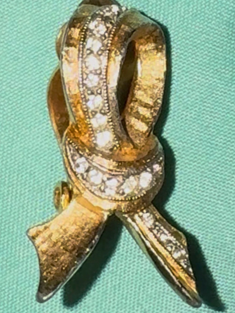 Pat Pend Clip on Earring 1 Gold Tone Bow with Paved Clear Crystals